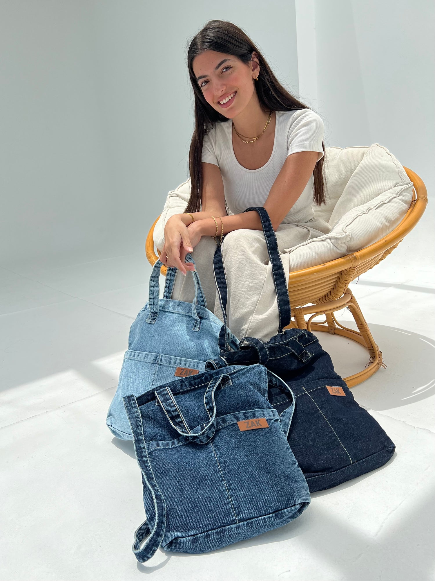 Vela Cross Tote Bags
